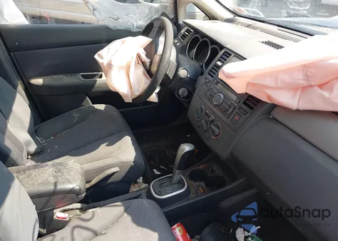 2009 Nissan Versa 1.8Sl z USA, uszkodzony, nr VIN 3N1BC13E39L409030